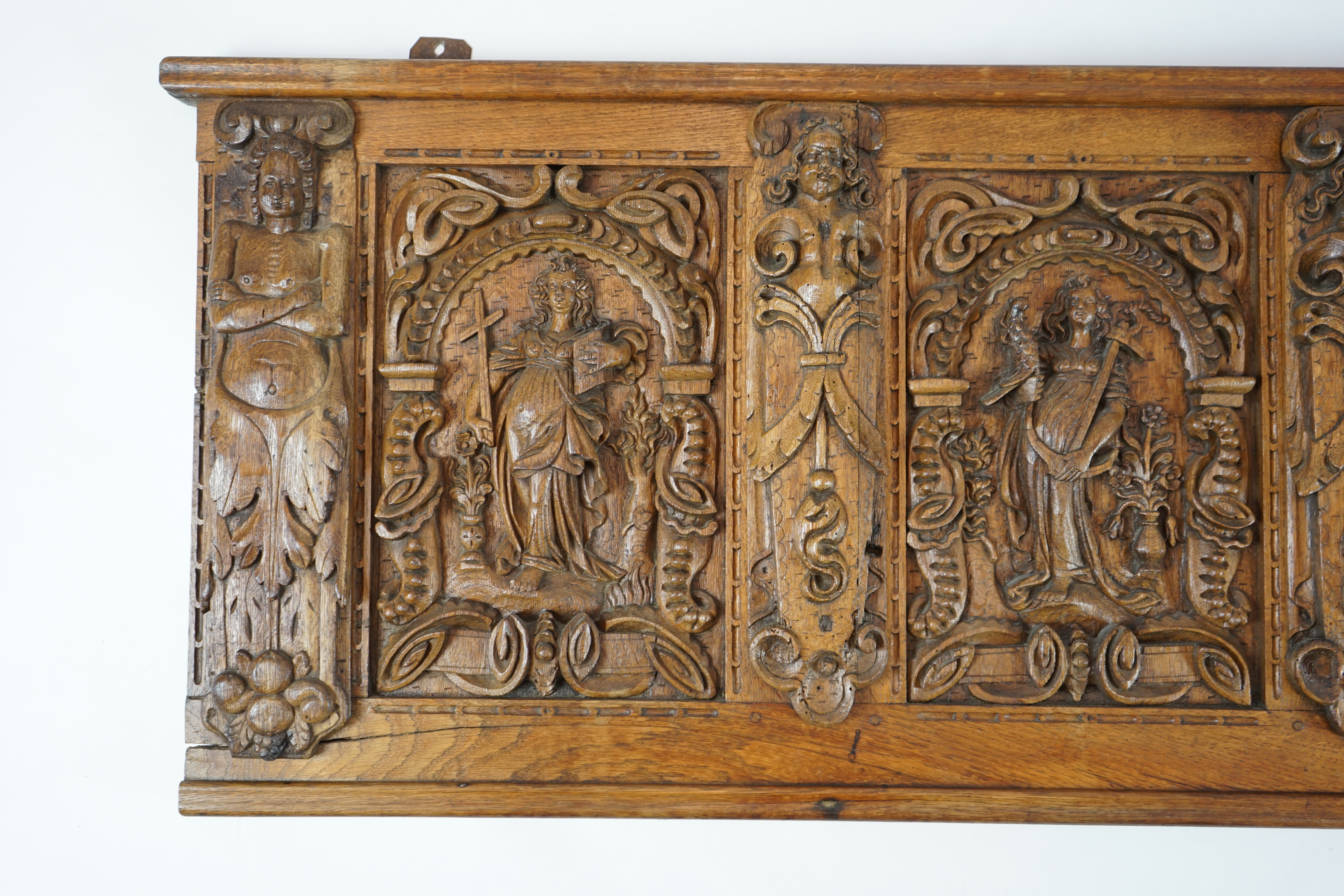 A 17th century and later Flemish carved oak panel